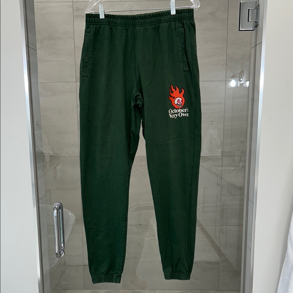 OVO Green Sweatpants with Red Flame Logo